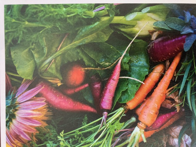 Whole-foods produce on a wooden surface